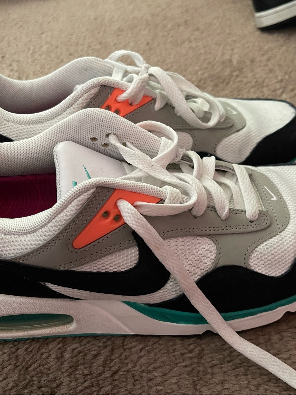 Worn once. Nike White  with Teal & Orange Accents. Had inserts which are removed